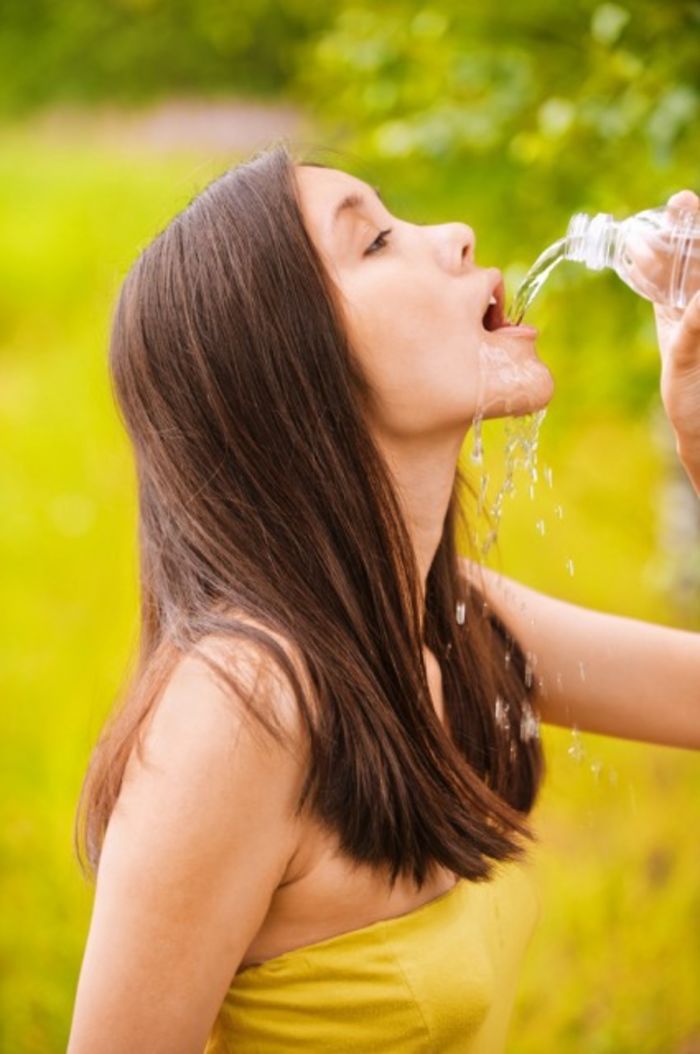 Women-Dont-Know-How-To-Drink-Water-Stock-Photos.