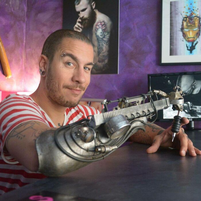 This Is Jc Sheitan Tenet, From Lyon, France. He Is A Tattoo Artist Amputee Who Uses A Prosthetic Tattoo Gun At Work!