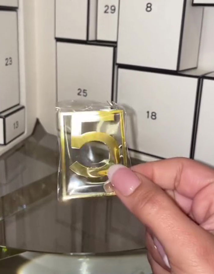 Woman shares hilarious reactions to unboxing a $825 luxury Chanel advent  calendar - Upworthy
