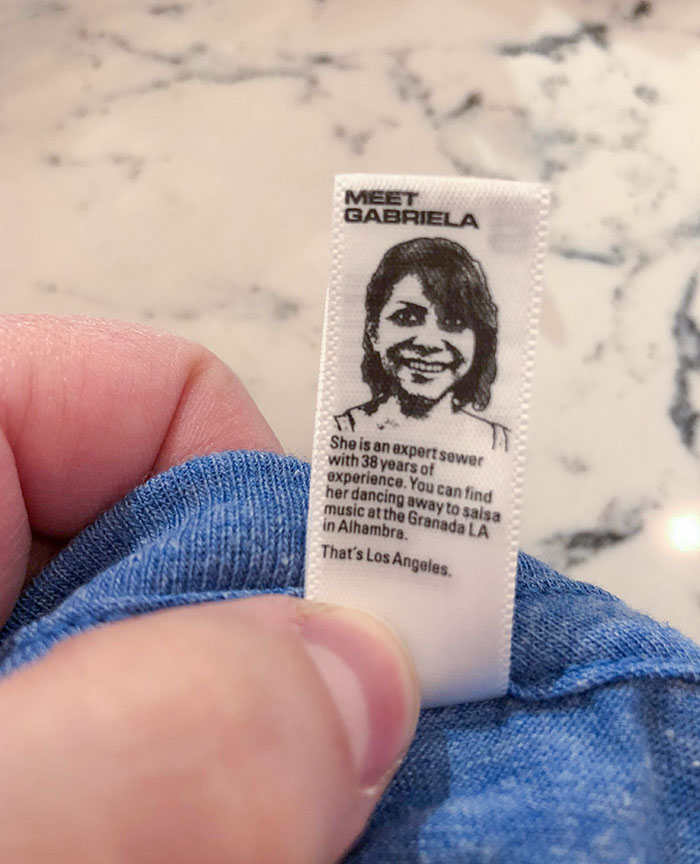 This T-Shirt Label Has A Bio Of Who Sewed It