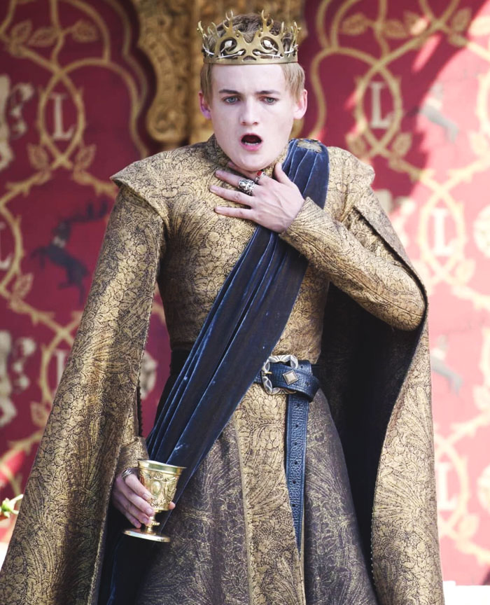 Joffrey Baratheon suffocating with a glass in his hand
