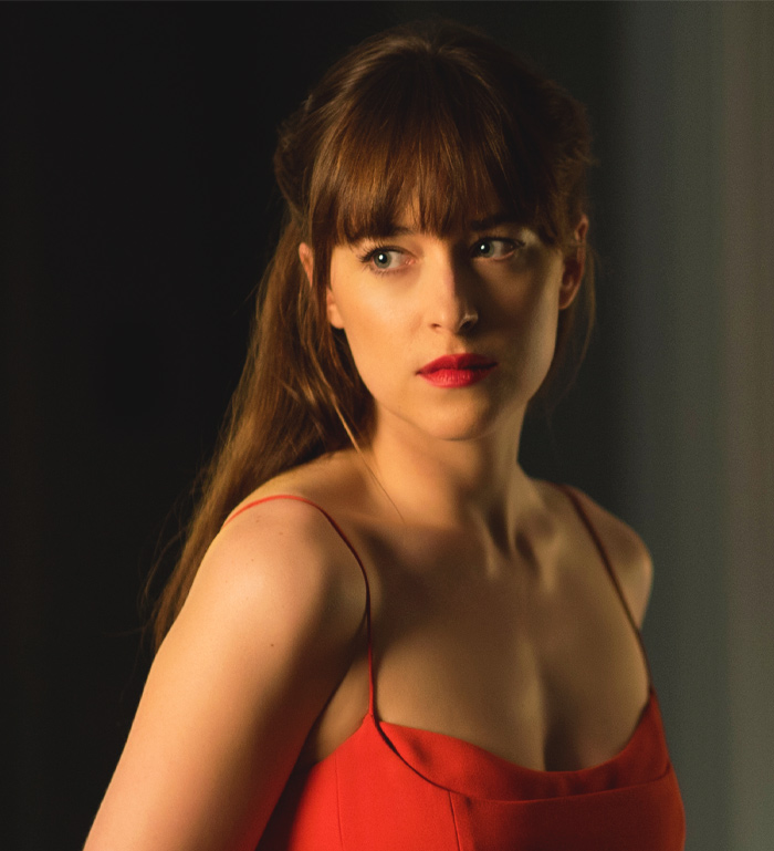 Anastasia Steele in a red dress