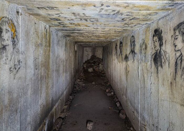 I Photographed This Old British WWII Air Raid Shelter—the Walls Lined With Portraits Of 1940s Women And Soldiers