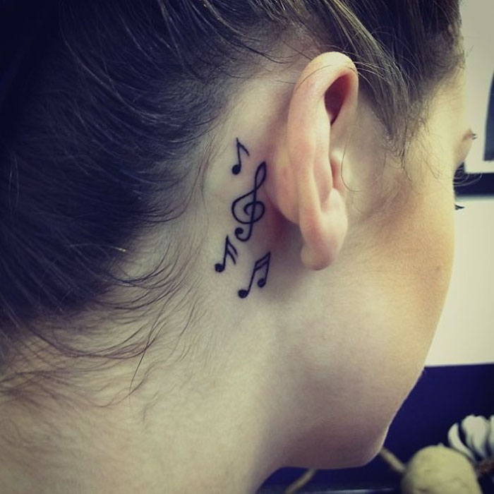 181 Tattooz Studio  Behind ear and above neck is partly hidden to get a  tattoo Most people like this placementone of our client got this tattoo  of music notations which looks