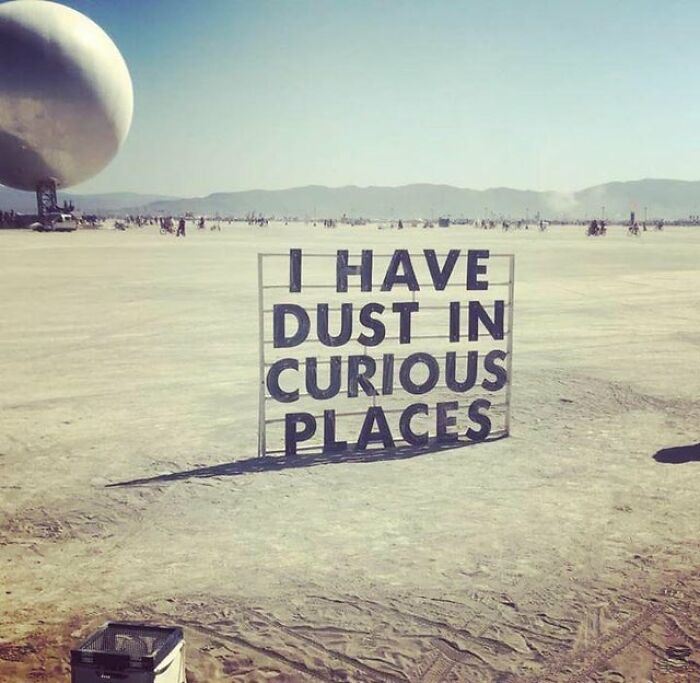 "I have dust in curious places" signboard