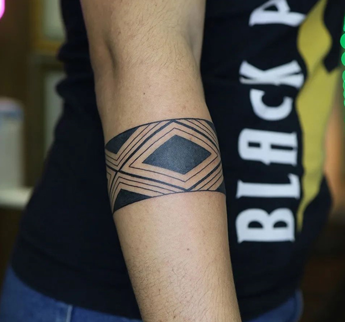 Geometric armband tattoo