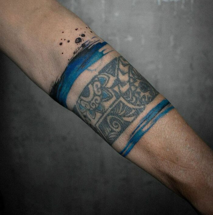 Blue watercolor armband tattoo