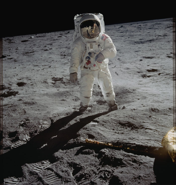 Picture of man on the moon with spacesuit