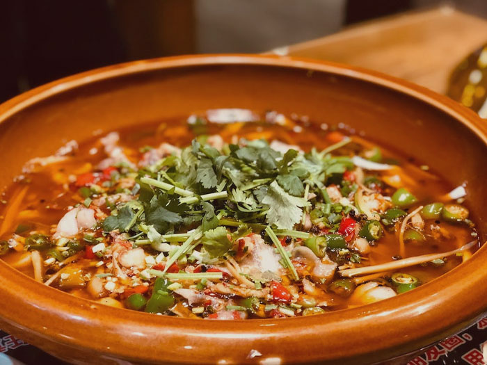 Freshly made food in a brown bowl 