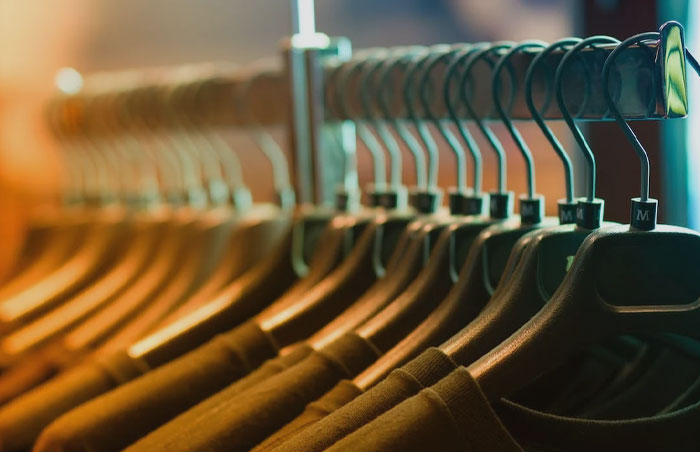 T-shirts hanging on hangers 