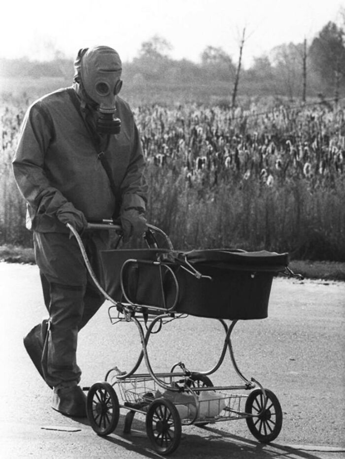 A Baby Found During The Clean Up Of The Chernobyl Accident Is Pushed In A Carriage By A Liquidator, 1986