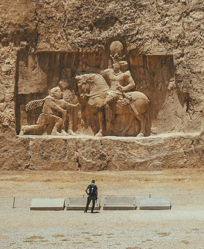 Roman Emperor Philippus The Arab Kneeling In Front Of Persian King Shapur I, Begging For Peace, And The Standing Emperor Represents Valerian Who Was Taken Captive By The Persian Army In 260 AD, The Triumph Of Shapur I, Naqshe Rostam, Iran