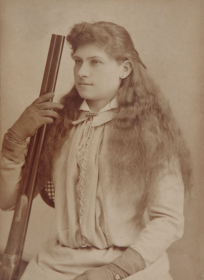 Picture of Annie Oakley posing with a gun