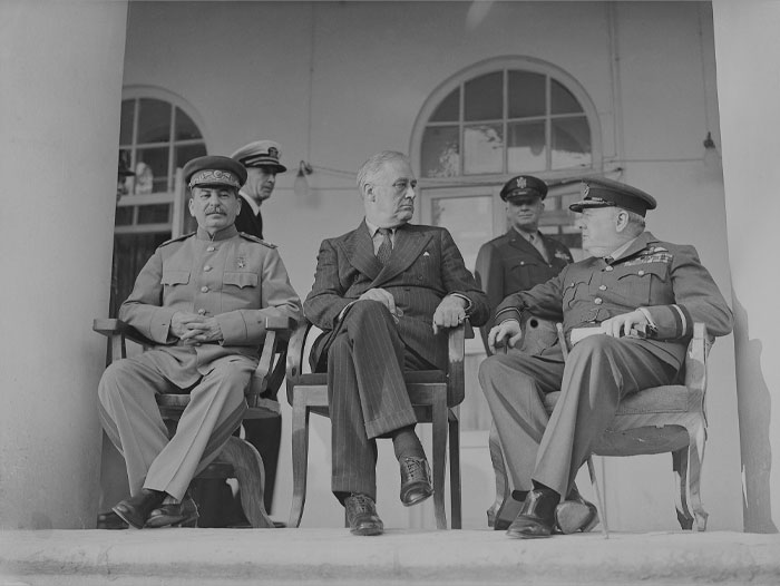 Black and white picture of Joseph Stalin, Franklin D Roosevelt and Winston Churchill in one place