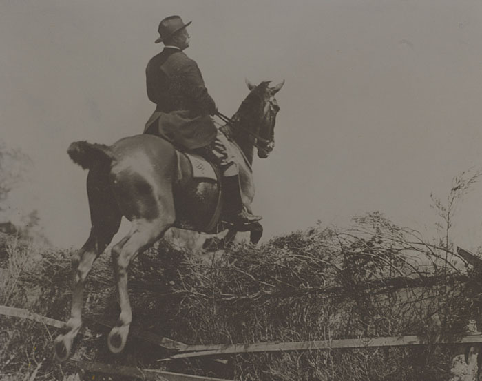 Picture of Theodore Roosevelt riding a horse