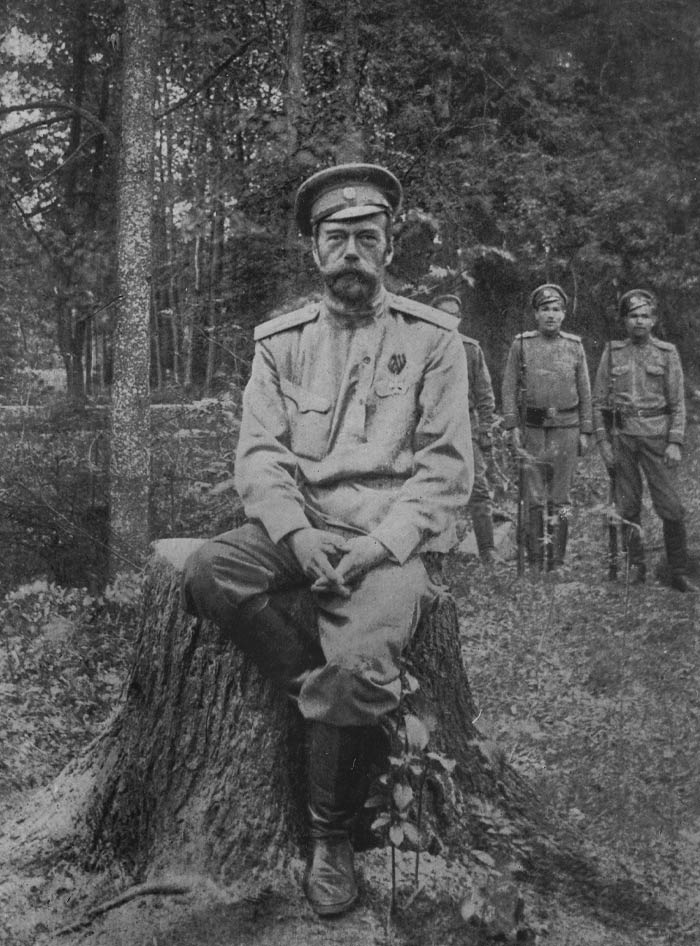 Black and white picture of Tsar Nicholas II sitting and posing