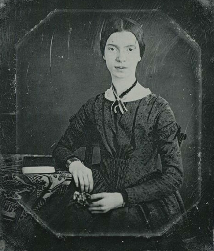 Black and white picture of Emily Dickinson posing