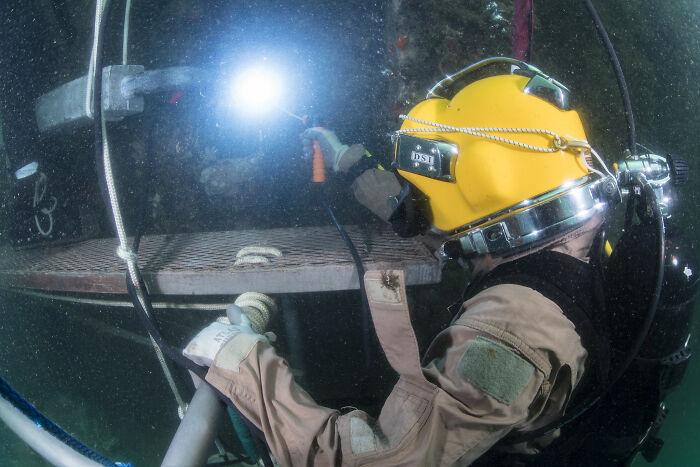 Person Welding Under Water 