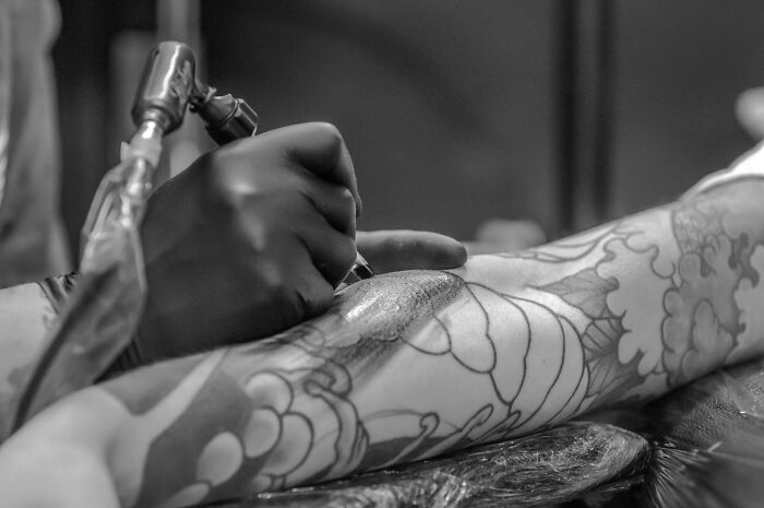 Persons Hand Being Tattooed 