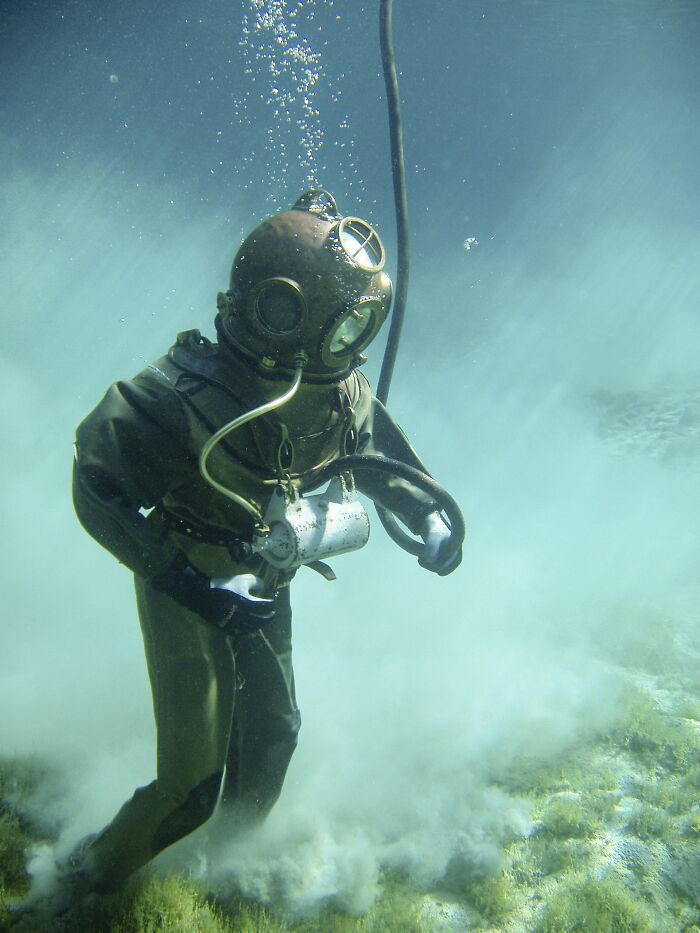 Person In A Diving Suit Under The Water 