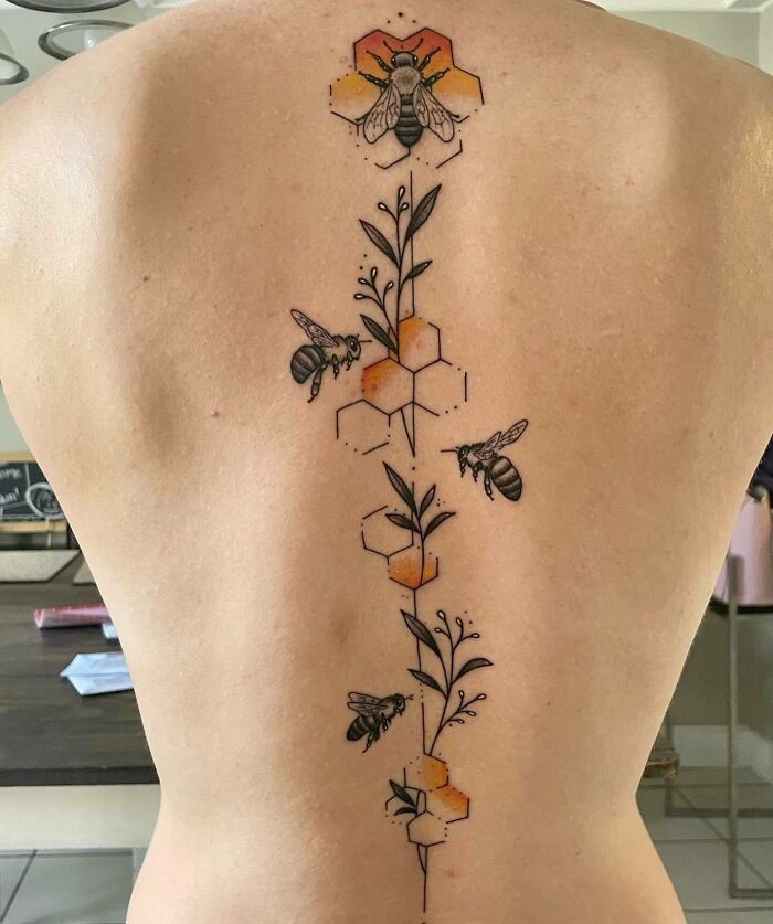 Floral spine tattoo | Floral back tattoos, Flower spine tattoos, Spine  tattoos for women