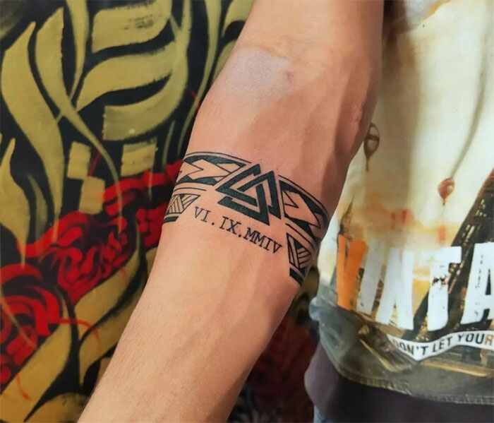 initials armband tattoo