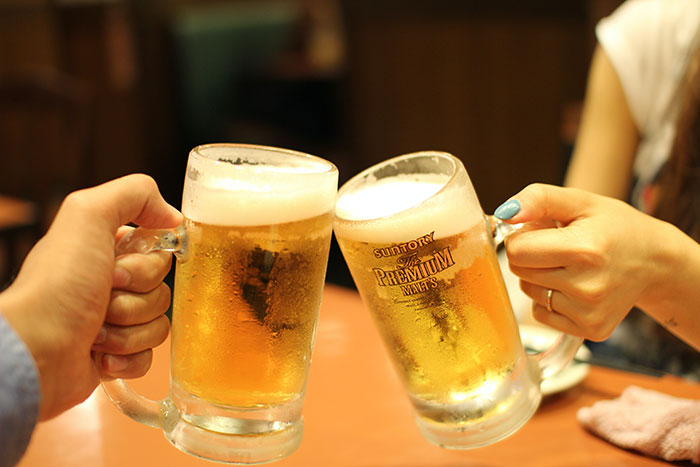 Person drinking beer