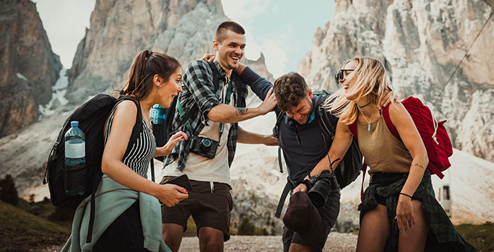 Friends standing and laughing