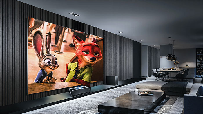 Room with huge TV and cartoon movie