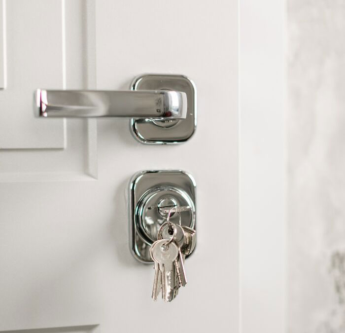 Door Handle And Hanging Keys In The Lock 