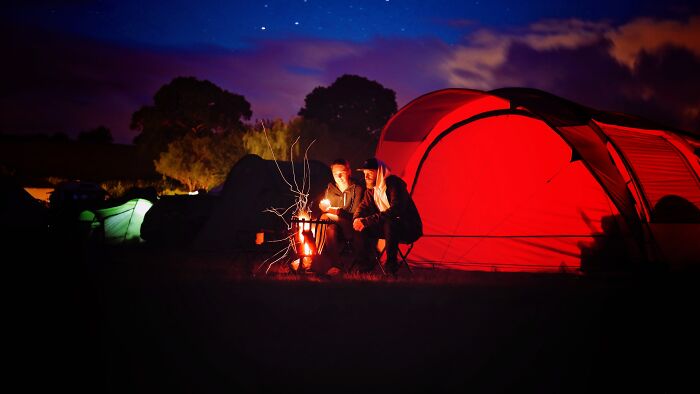 People Camping Outside In The Night 