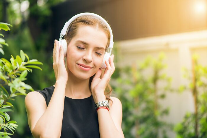 Woman Listening To Music Outside 