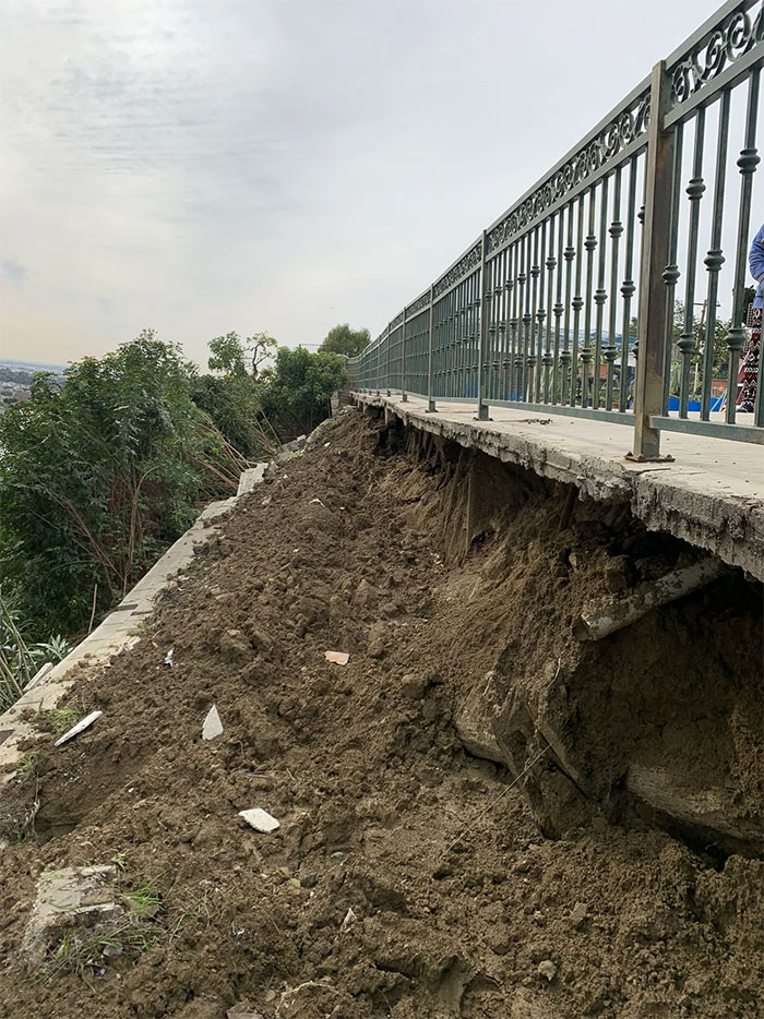 This Home’s Retaining Wall Shifted Forward During The Rains And Left Their Backyard Slab Completely Undermined