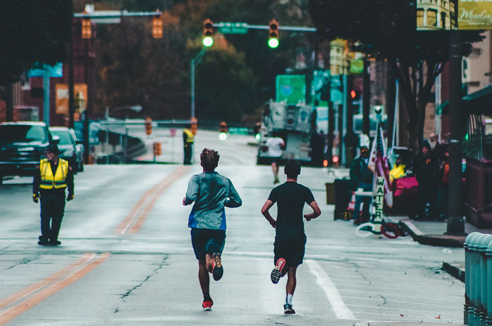 Persons running in the streeet