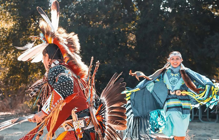 Person wearing traditional clothes and celebrating Summer Solstice Indigenous festival