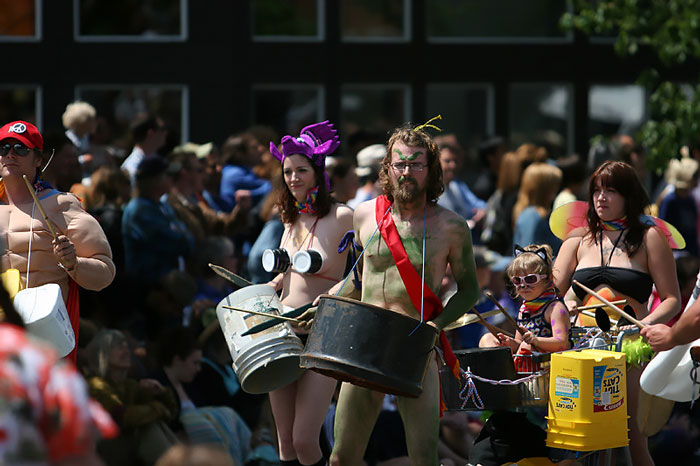 Persons wearing different clothes celebrating Fremont Fair 