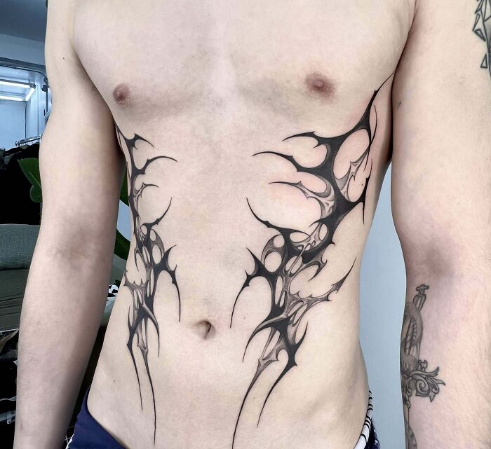 36 Awesome Rib Tattoo Ideas for Men & Women in 2024
