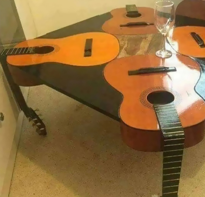 Cursed meme of guitar table
