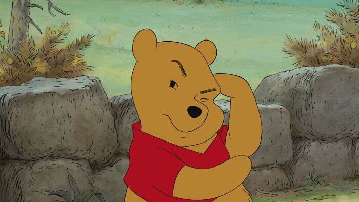 Winnie the Pooh looks thoughtful