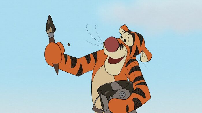 Tigger from Winnie the Pooh holding a buck of paint