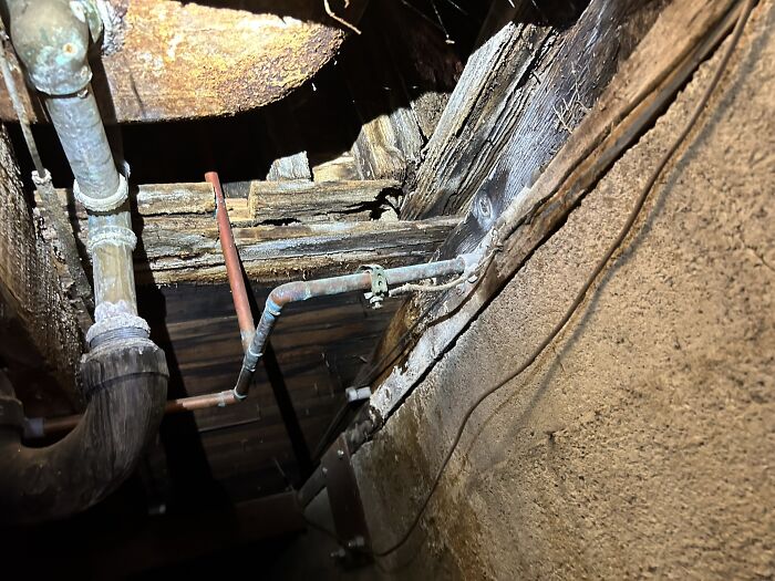 Water Strikes Again! This Crawlspace Is A Prime Example Of The Havoc That Moisture Can Wreak. Water Has Seeped Into The Vulnerable Wooden Elements, Eroding Their Strength And Stability. Water Intrusion Has Taken Its Toll, Leaving Behind A Clear And Undeniable Sign Of Extensive Wood Rot