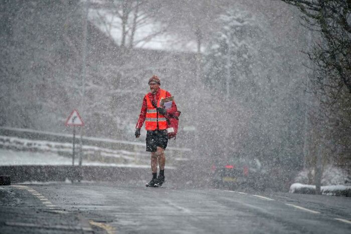 Is There A More British Sight Than A Postie In Shorts In The Snow?