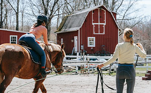 Entitled Horse Rider Made To Literally Scoop Horse Dung Into Her Backpack After Being Caught By Landowner