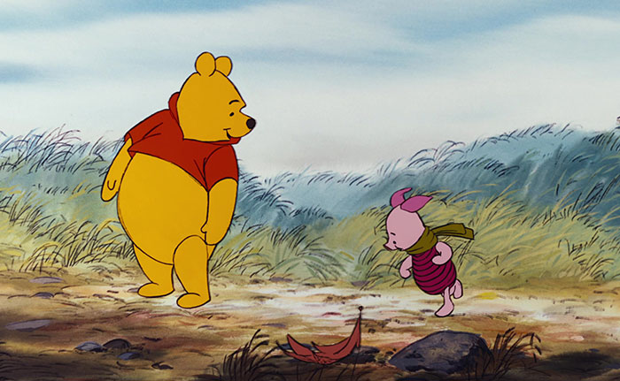 Piglet and Winnie the Pooh walking