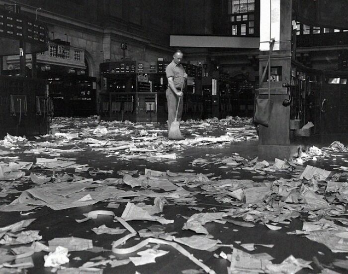 A Janitor Sweeps The Floor Of The New York Stock Exchange Following The Wall Street Crash Of 1929