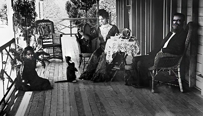 A Man And Woman Having Tea On The Veranda Of Their Mt. Nutt Home At Bowen In The Early 1900s