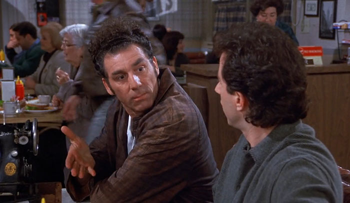 Cosmo Kramer wearing brown shirt