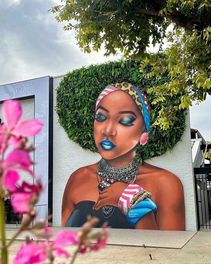 Street Artist Continues To Paint Portraits On Walls Next To Trees That ...