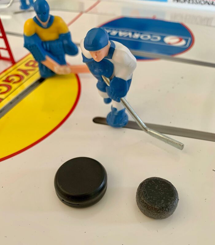 Table Hockey Puck After About Four And A Half Years Of Playing. New One On The Left For Comparison