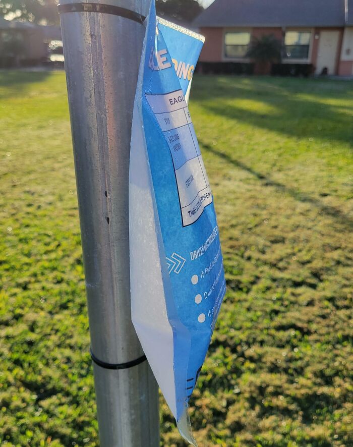 This Laminated Paper Sign Has Turned Into A Bag Full Of Water